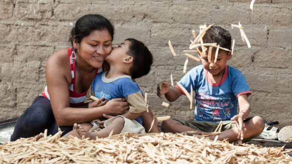 Mother with her two children, Peru