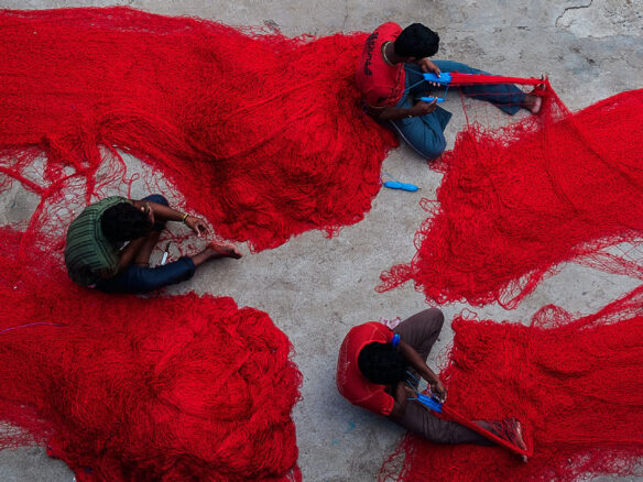 Men working with fishing nets.